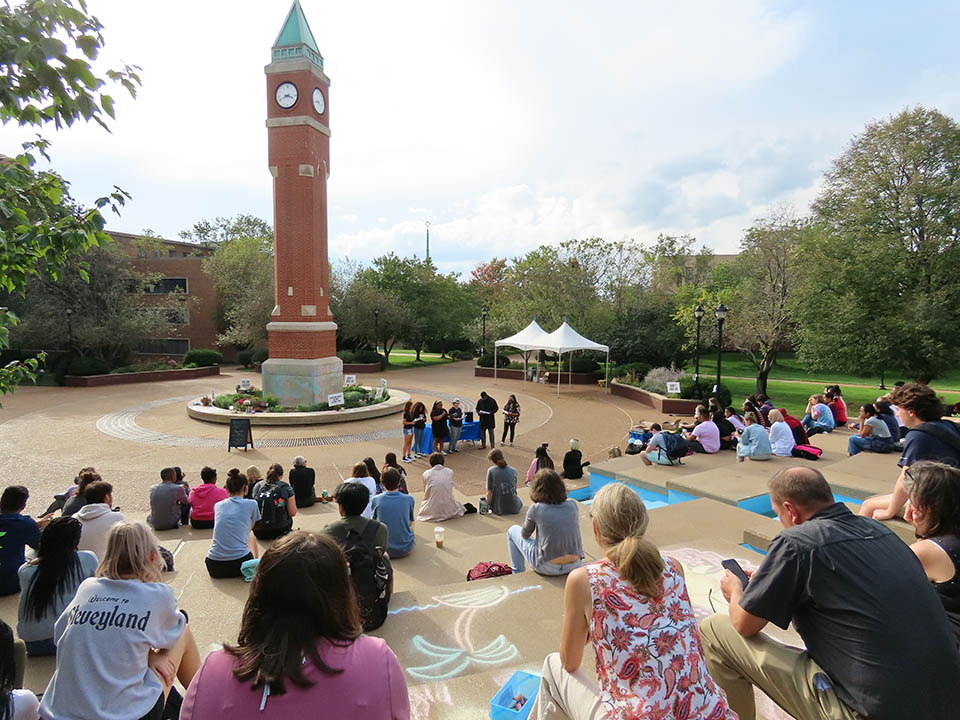 A group of SLU students read the names and shared the stories of black people killed by police officers during an Occupy SLU Week event Wednesday, Oct. 13. Photo by Joe Barker.