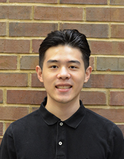 Jeffrey Thai poses for a photo at the Chaifetz School of Business