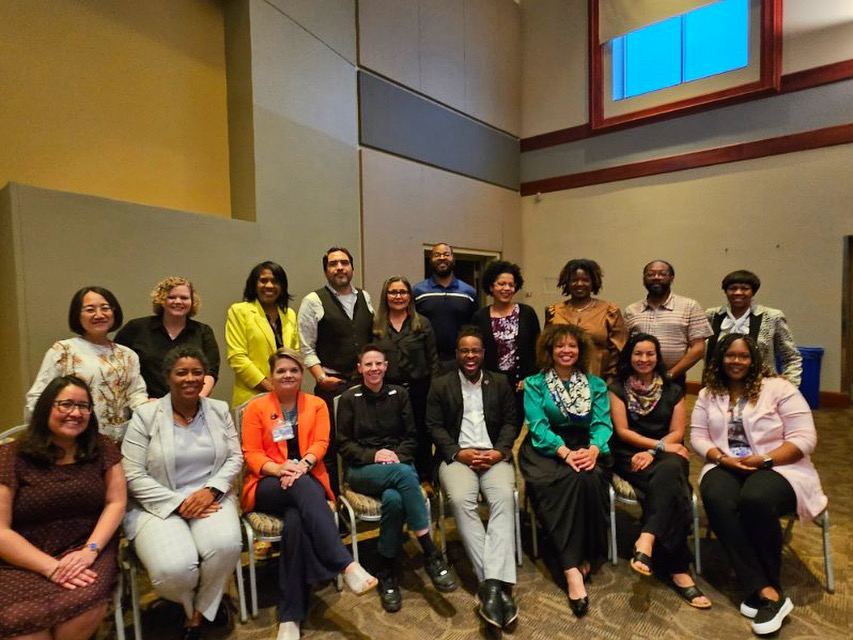 Saint Louis University faculty gathering at the 2024 Saint Louis Gateway Scholars Network reception