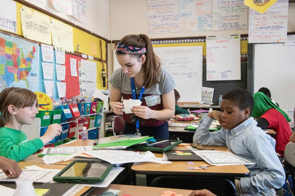 Mason student teacher and two students