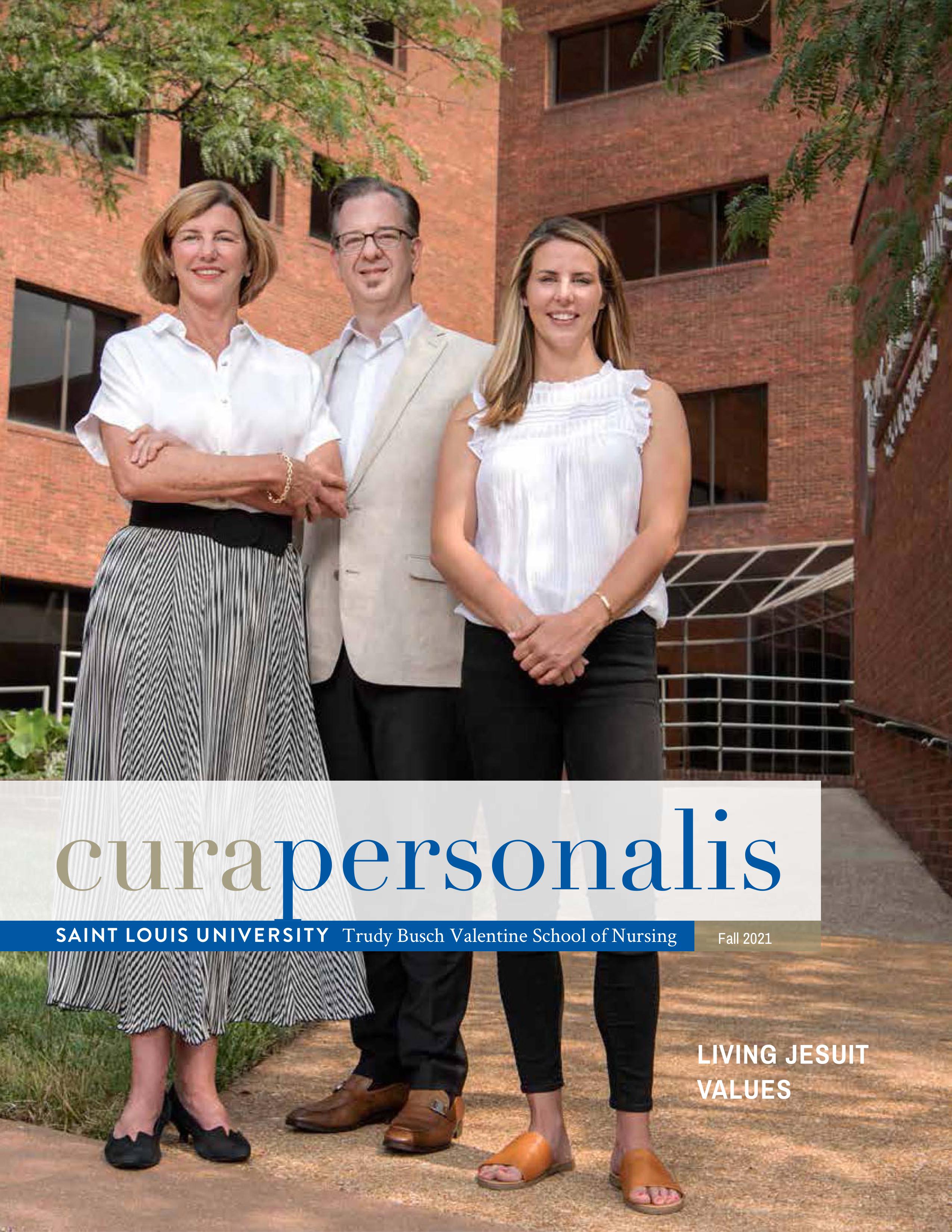 The 2021 cover of cura personlis showing a three people posed outside the nursing school